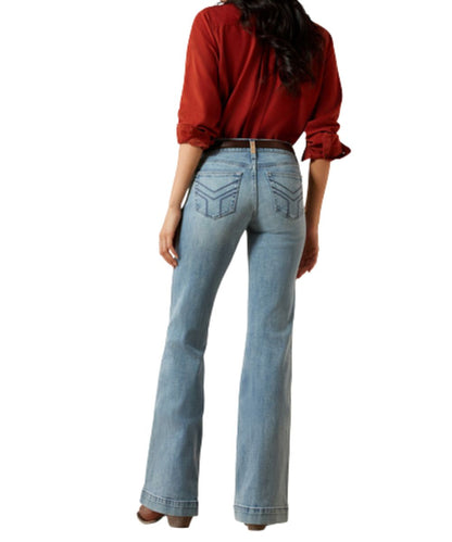 Back view of the women's light wash trouser jean featuring the contrast stitched back pockets and perfect rise
