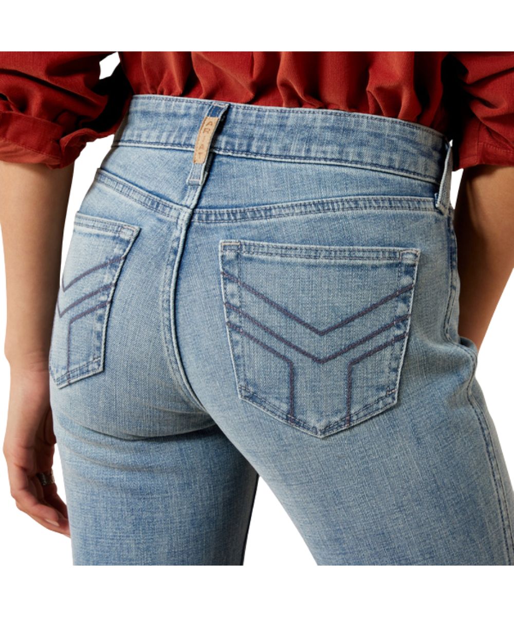 Close-up view of the contrast stitched back pockets, contoured waistband, and perfect rise