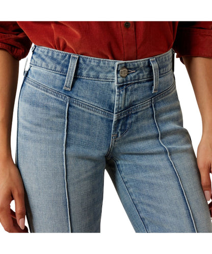 Close-up view of the women's laney trouser jean featuring the western yoke up front detailing and leg-lengthening pin tucks, with no front pockets