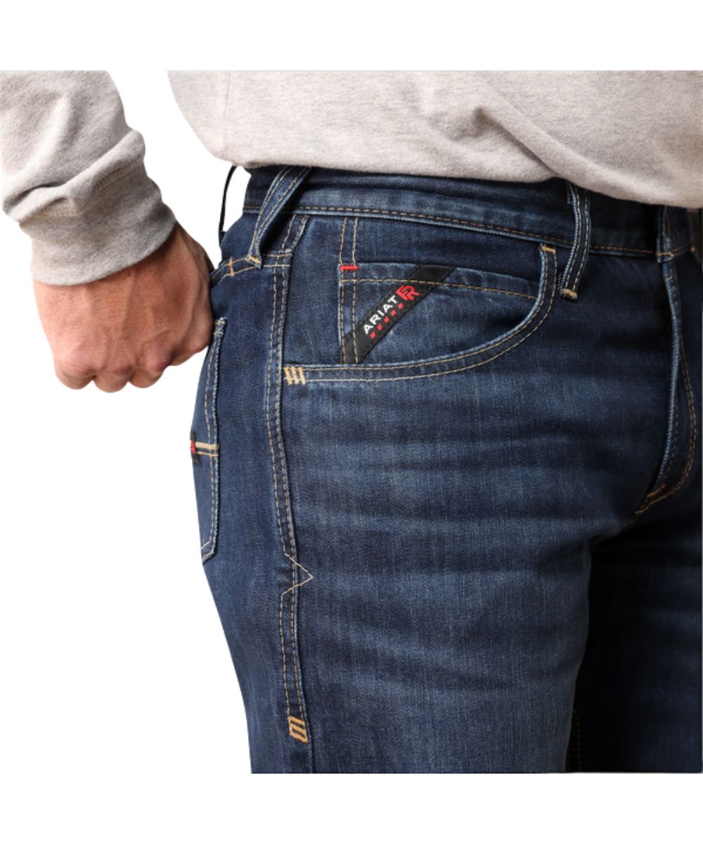 Close-up view of the standard rise on the men's woodlake flame resistant jean featuring the five pocket styling, reinforced belt loops, and extra-deep front pockets