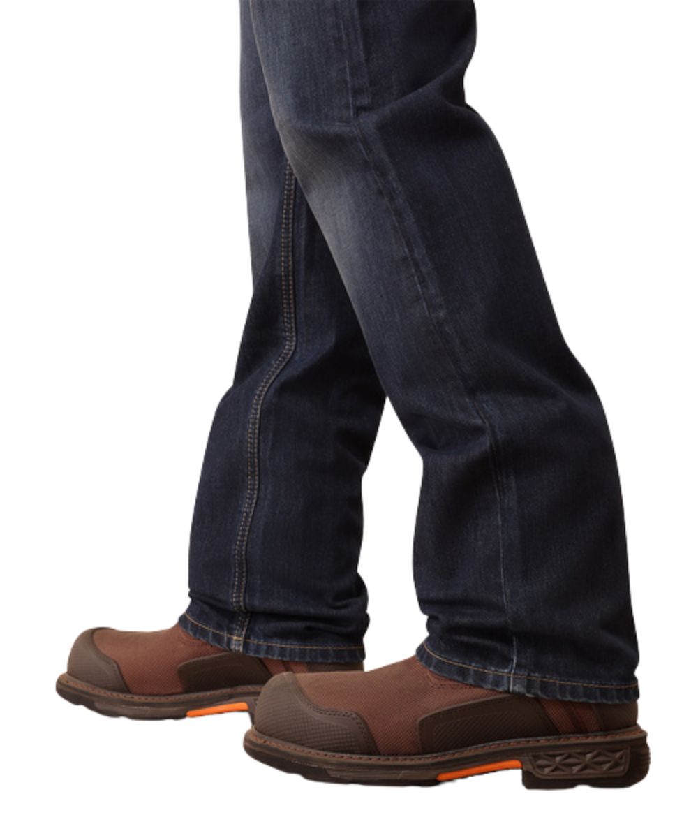 Close-up view of the men's dark wash stackable boot cut leg jean