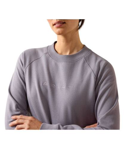 Close-up view of the logo embroidery across the chest