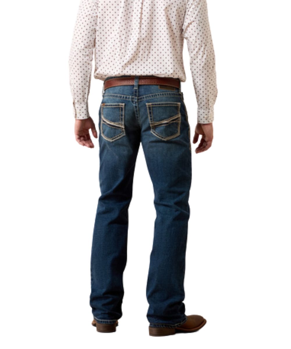 Back view of the men's dark wash boot cut jean featuring the mid rise and relaxed fit