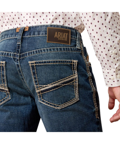 Close-up view of the back pocket featuring the contrast pocket embroidery and loop lock on the back belt loop for extra durability