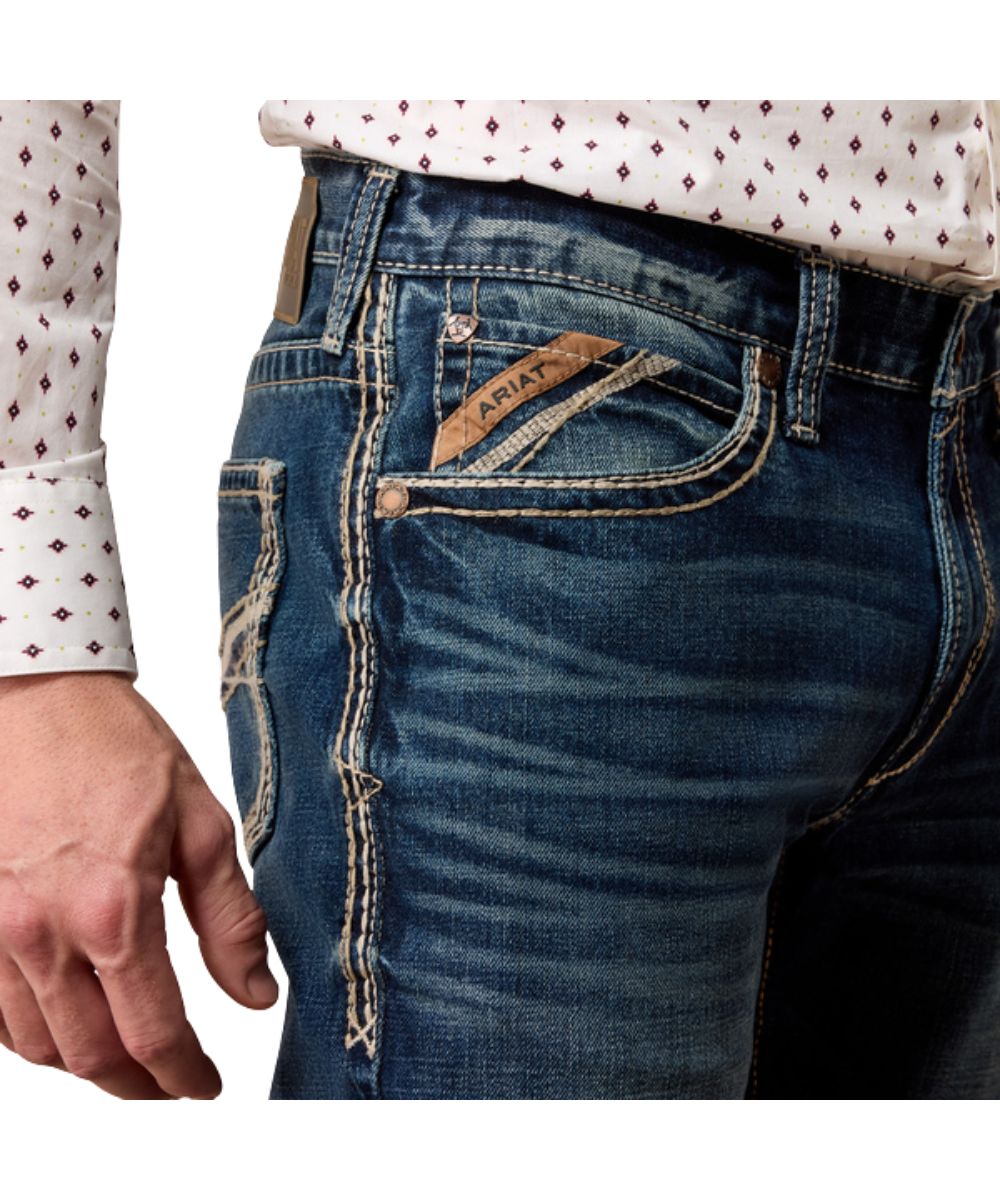 Close-up view of the front pocket featuring the extra deep front pockets, heavy duty zipper and hardware, and mid rise