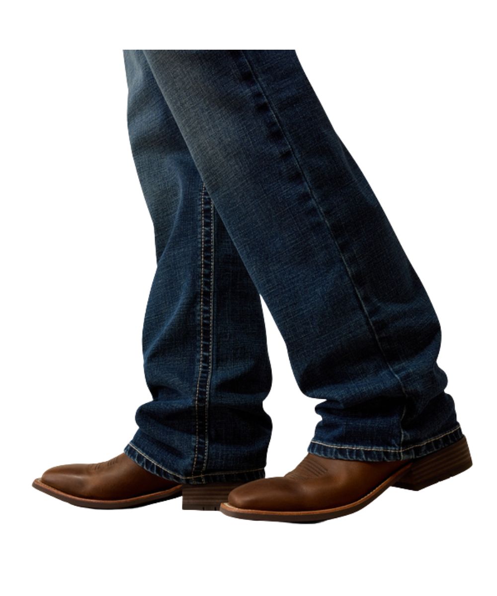 Leg view of the classic stackable boot cut leg in the silverton dark wash men's m4 jean