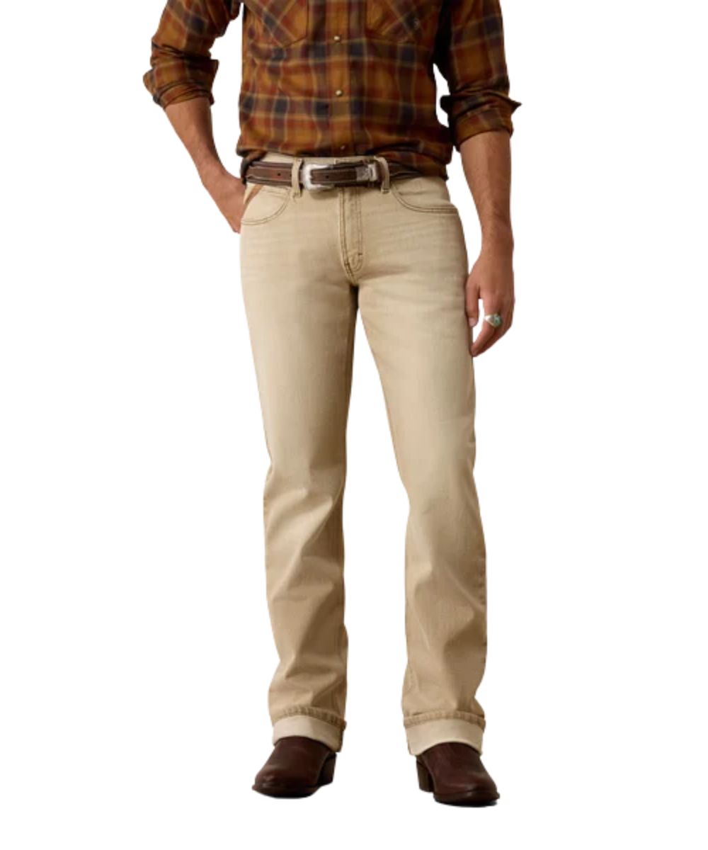 Front view of the men's cedar brown Ariat M4 Relaxed Grizzly Boot Cut Jean featuring the relaxed fit, mid rise, five pocket styling, and TEKStretch fabric