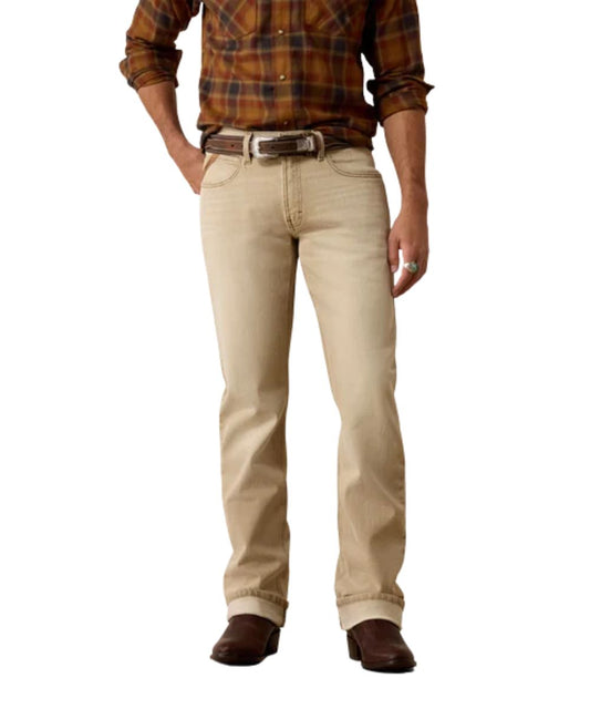 Front view of the men's cedar brown Ariat M4 Relaxed Grizzly Boot Cut Jean featuring the relaxed fit, mid rise, five pocket styling, and TEKStretch fabric
