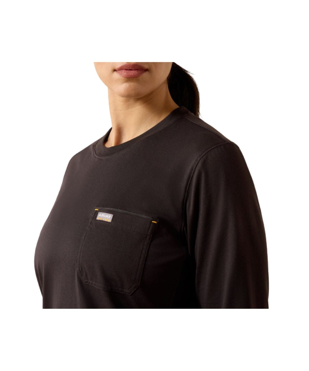 Close-up view of the reinforced chest pocket, this women's long sleeve work tee features the stain-repellent, moisture wicking, and ventilated properties