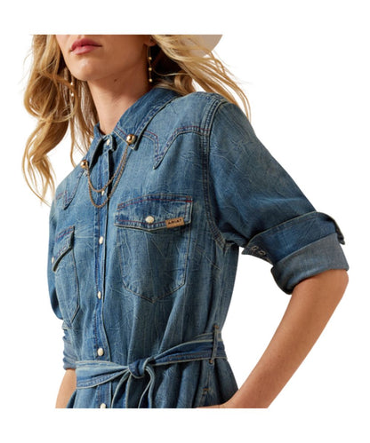 Close-Up View Of The Women's Denim Dress Featuring Snap Flap Chest Pockets And A Removable Waist Belt