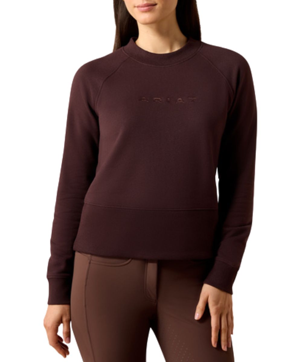 Front view of the women's chocolate plum Ariat Martine Sweatshirt featuring the slightly cropped hem, retro vibes, and logo embroidery across the chest