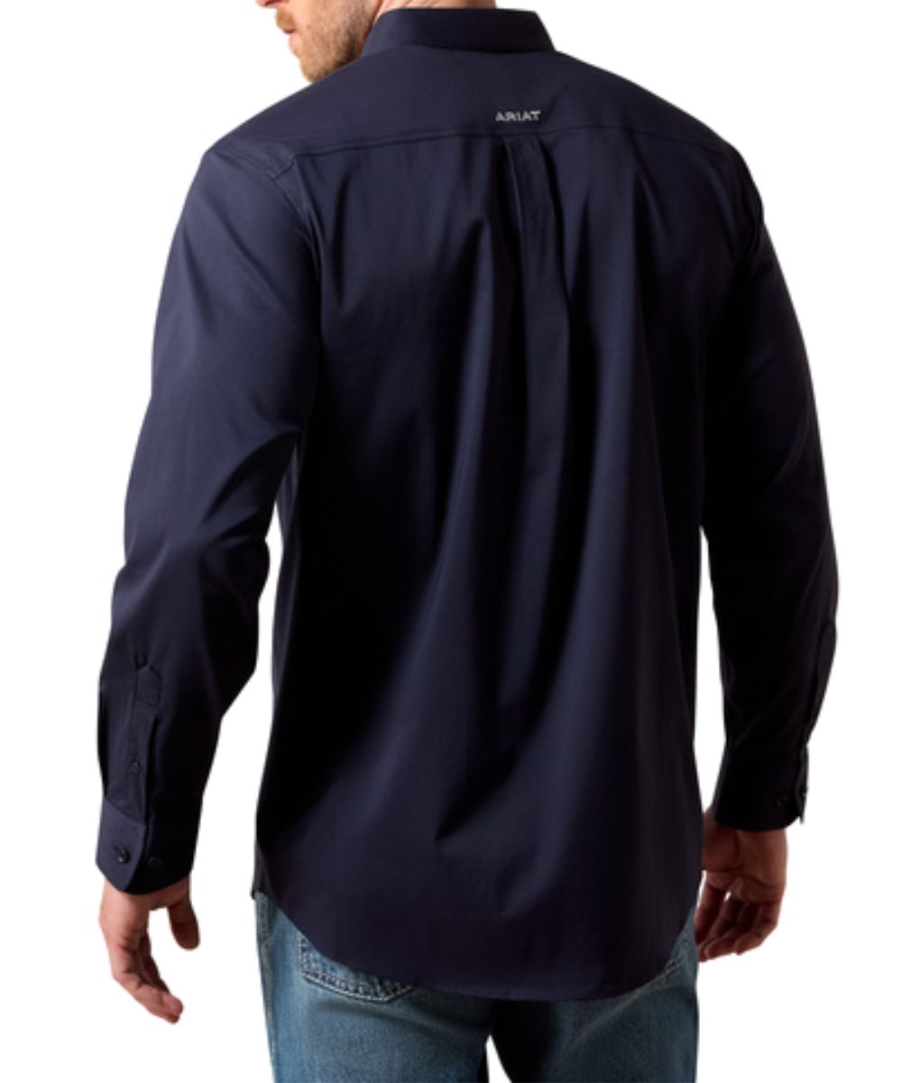 Back view of the men's navy solid print classic fit long sleeve button down featuring the straight back yoke with box pleat