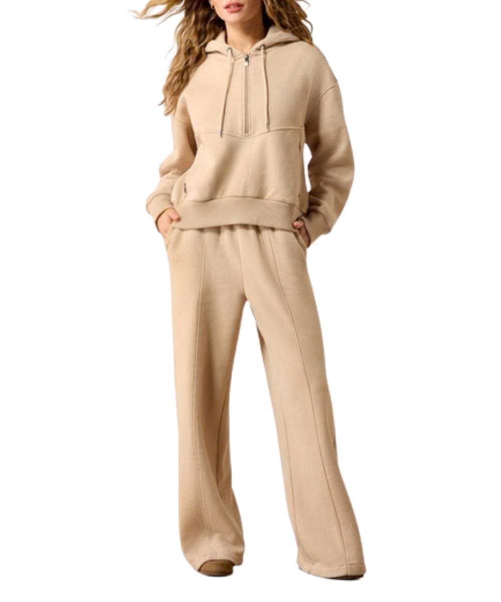 Outfit view of the women's moonstone Ariat compass outfit featuring the matching 1/2 zip sweatshirt paired with the matching joggers