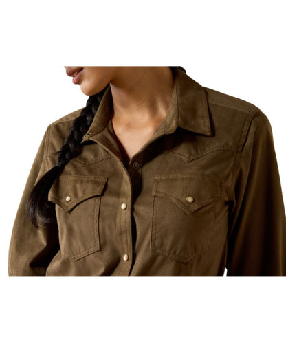 Close-up view of the faux suede solid print olive green western women's shirt featuring the spread collar, single point snap flap chest pockets, and western yokes