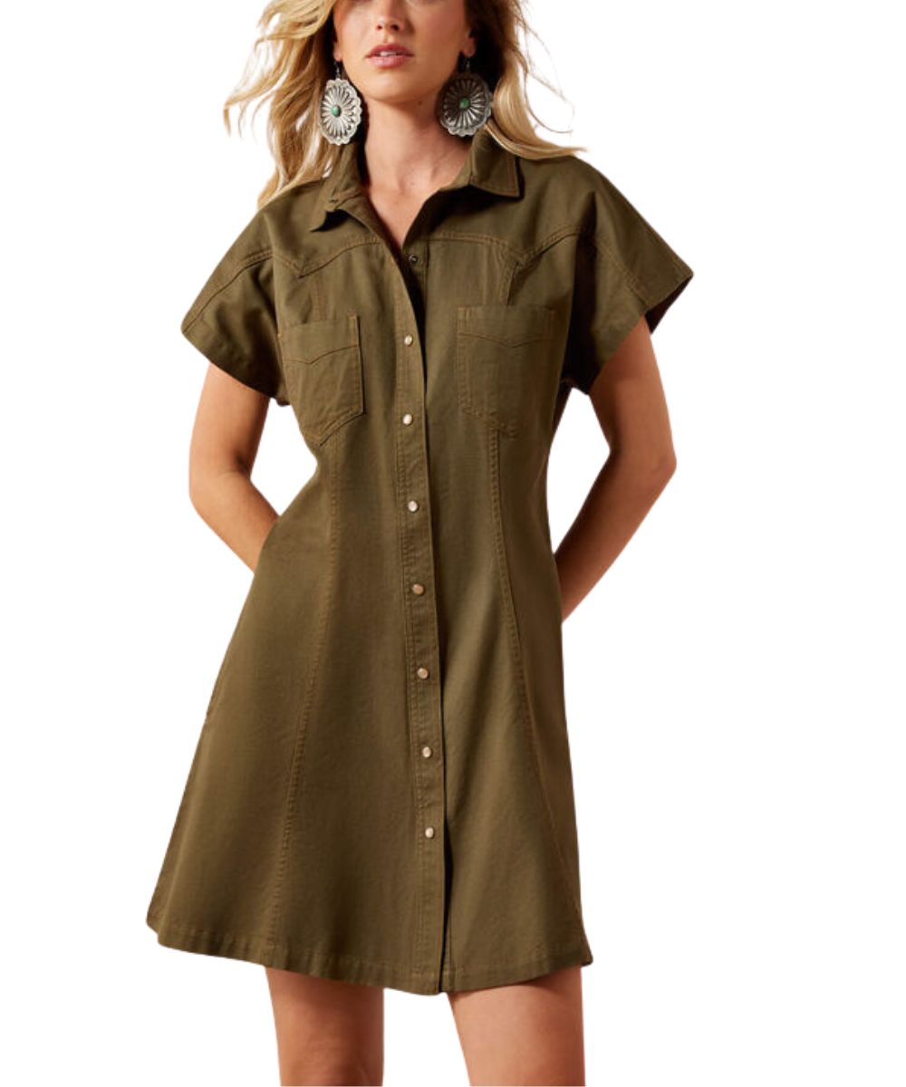 A woman wearing a short-sleeve button-front shirt dress in olive green, shown against a plain white studio background.