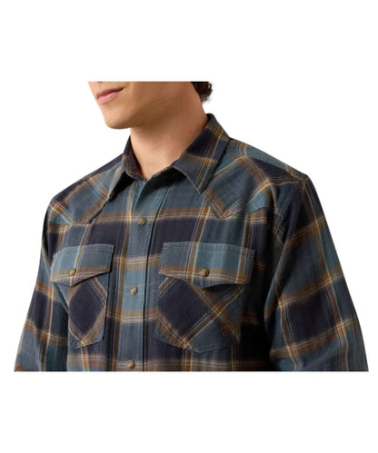 Close-up view of the plaid print, snap flap chest pockets, and single point front yokes