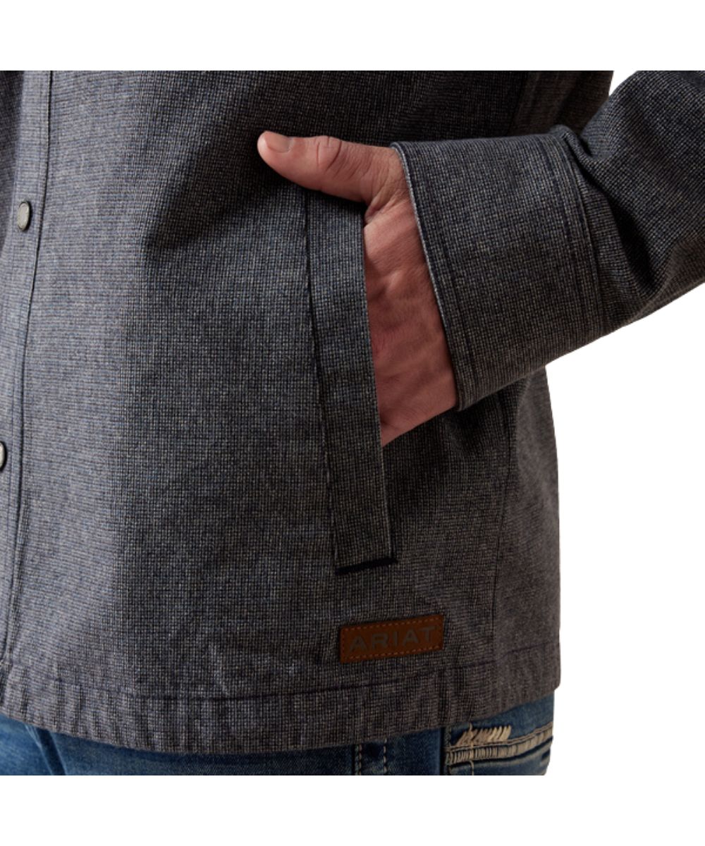 Close-up view of the men's inkwell shirt jacket featuring the open hand pockets