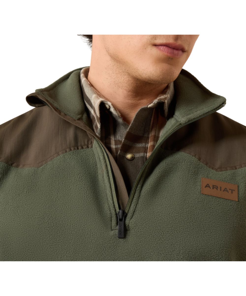 Close-up view of the mock collar, leather logo label on the chest, and the single point western yokes