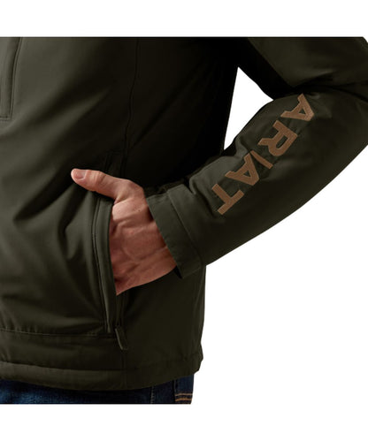 Close-up view of the embroidered logo on the sleeve, and the zippered hand pocket on the men's forest night pioneer jacket