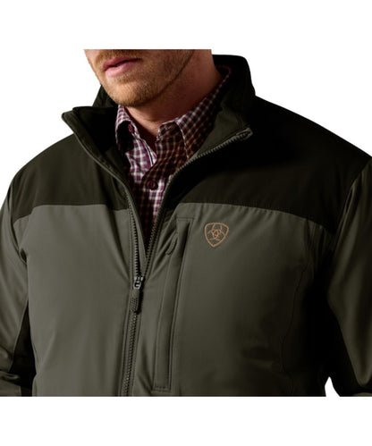 Close-up view of the color blocked design on the men's forest night jacket featuring the zippered chest pocket