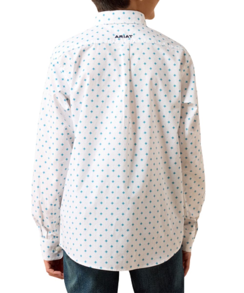 Back view of the boy's white long sleeve button down shirt featuring the blue geometric print, straight back yoke with box pleat, and maritime blue logo embroidery
