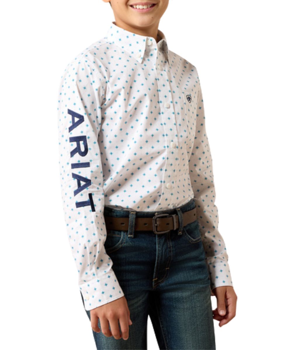 Front view of the boy's Ariat Team Emory Classic Fit Button Down Shirt featuring the maritime blue logo embroidery, long sleeves, and blue geometric print