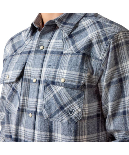Close-up view of the blue/grey plaid print featuring the single point front yokes and snap flap chest pockets