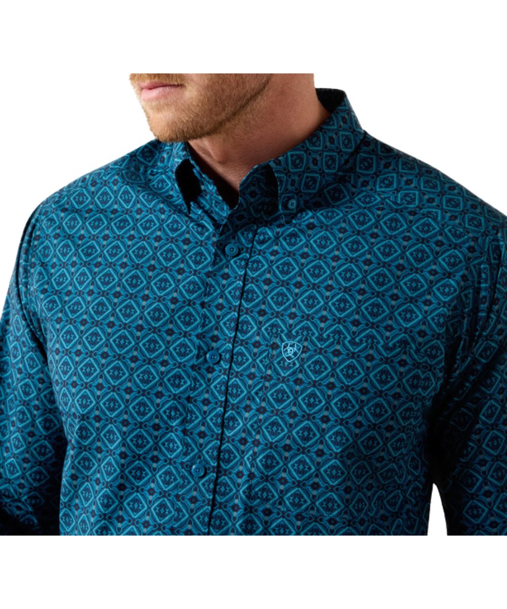Close-up view of the medallion print, chest pocket, and button down collar