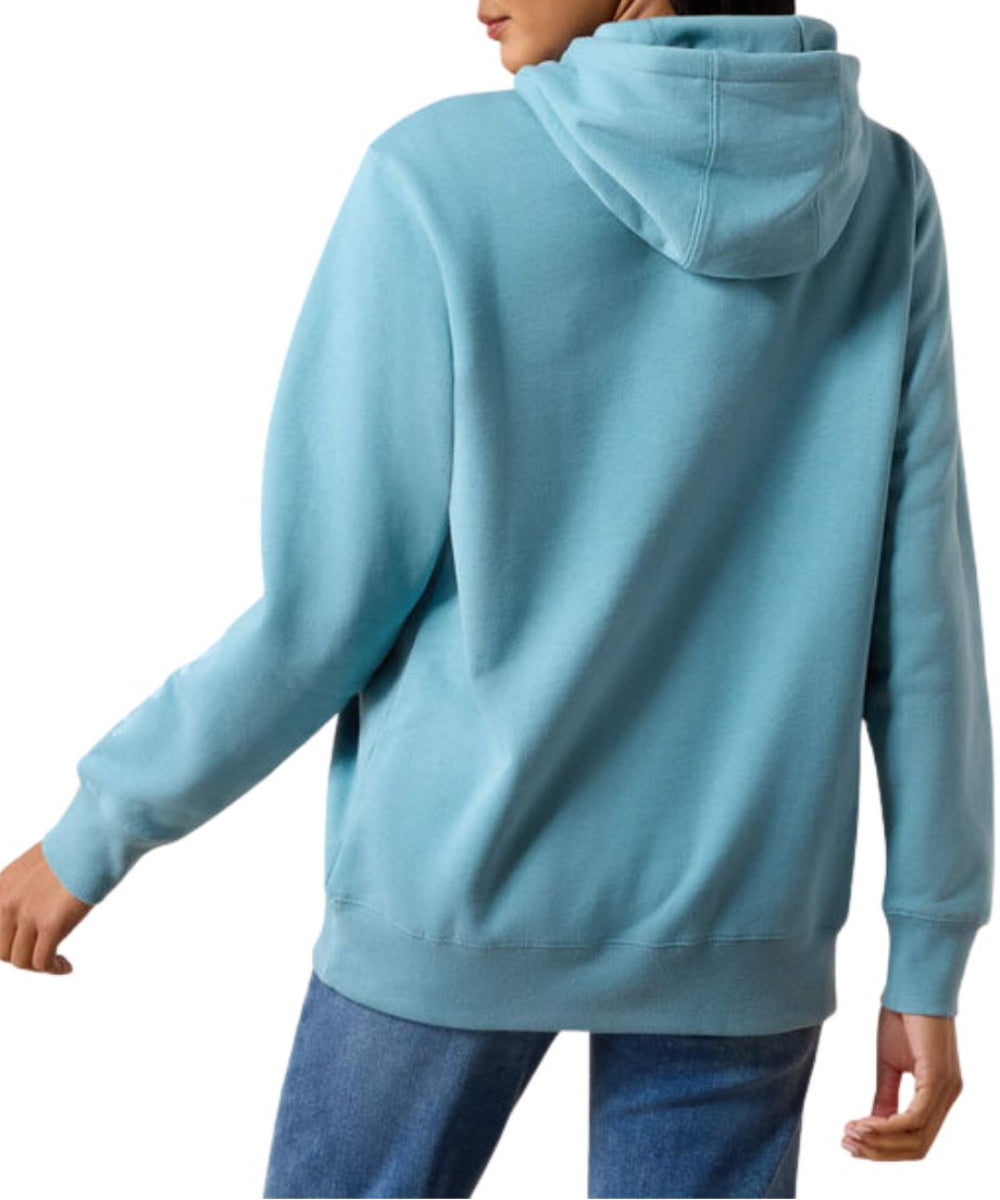 Back view of the women's adriatic blue hoodie featuring the logo embroidery on the left sleeve