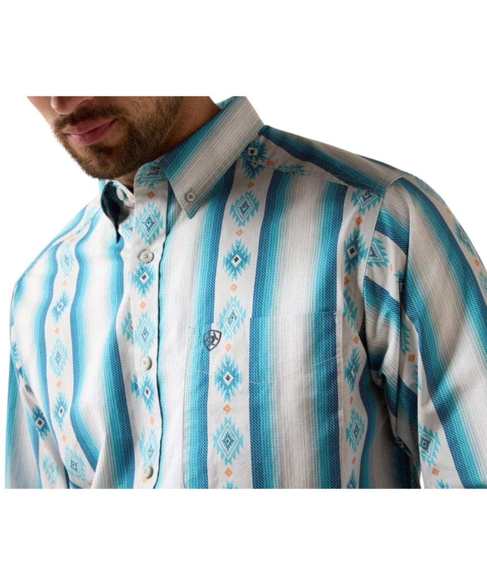 Close-up view of the men's blue and white shirt featuring the grey serape striped print
