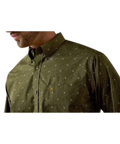 Close-up view of the ikat longhorn print and single open chest pocket with a hidden pen slot