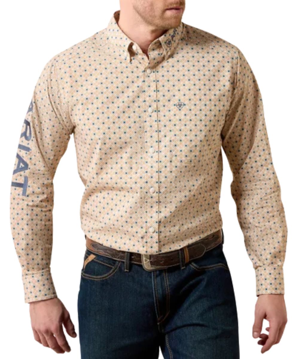 Front view of the men's Ariat Team Dusty Classic Fit Button Down Golden Medallion Blue Nights Print Shirt featuring the logo embroidery and extra length in the body and sleeves