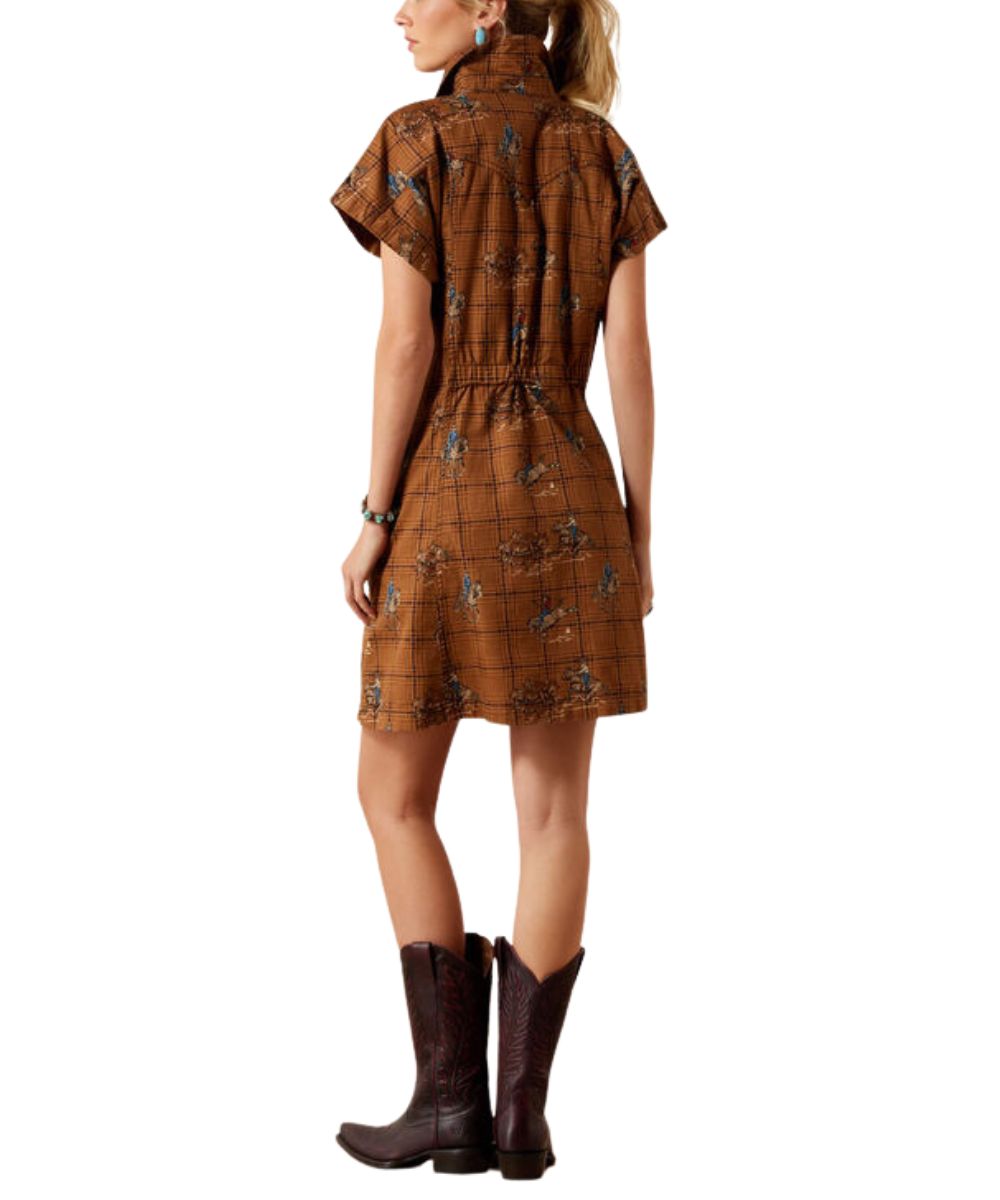 A woman shown from the back wearing a brown short-sleeve dress with a subtle grid and floral pattern, paired with dark brown cowboy boots, against a plain white background.