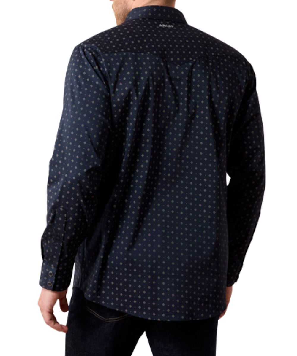 Back view of the men's dark navy long sleeve western snap shirt featuring the single point back yoke and night sky geometric print