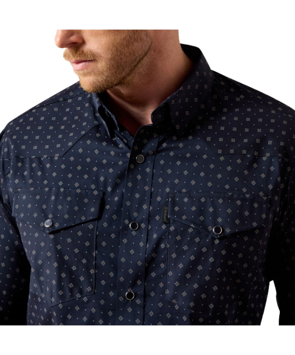 Close-up view of the men's dark navy snap shirt featuring the pearl snaps and snap flap chest pockets with a hidden pen slot