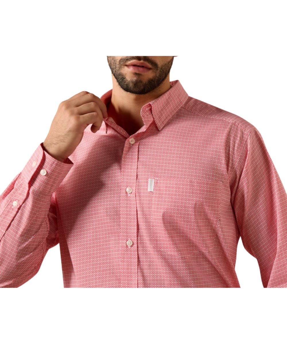 Close-up view of the white geometric print on the men's scarlet shirt featuring the single open chest pocket with hidden pen slot and hidden button down collar