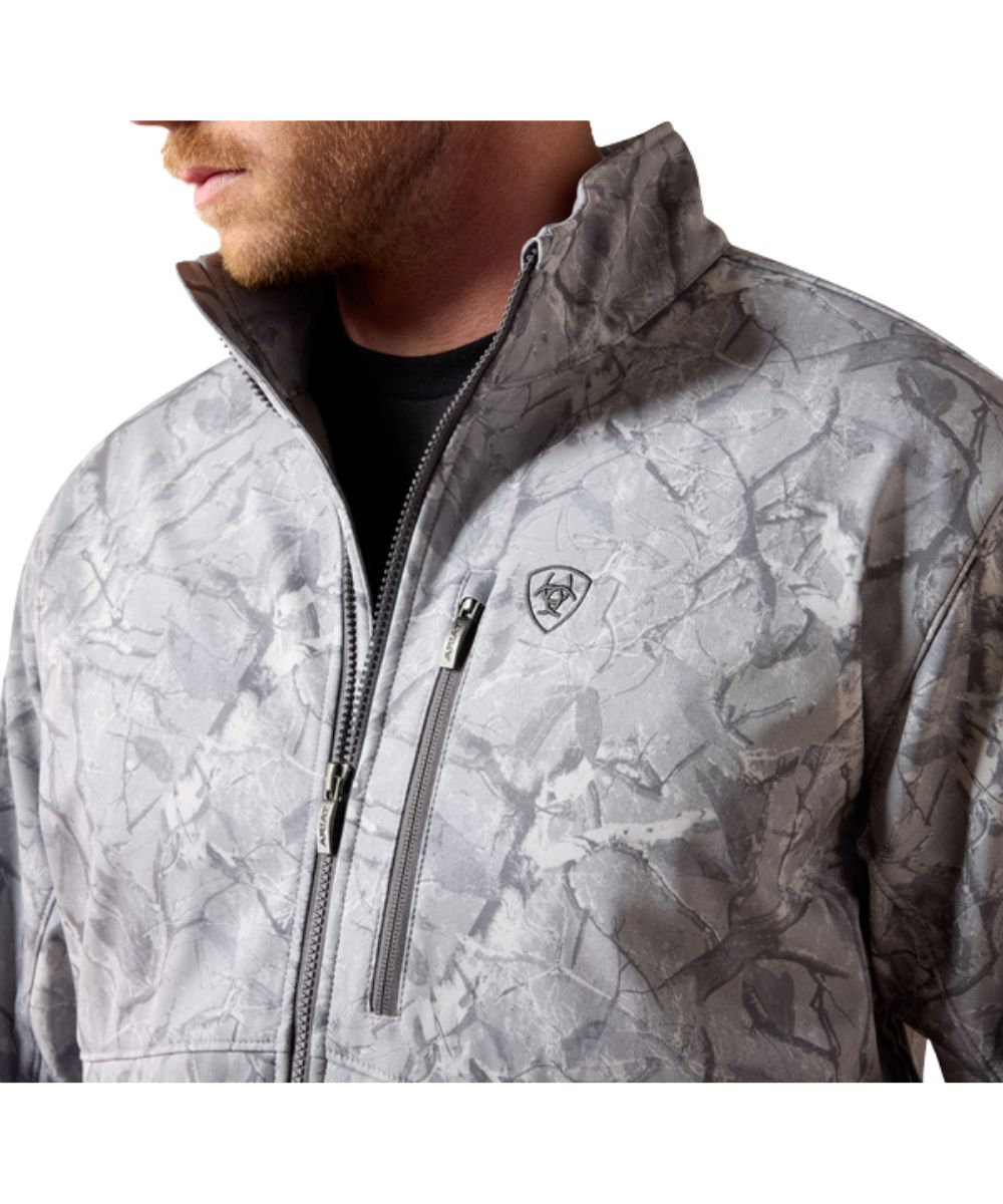 Close-up view of the mock collar, zip closure, zippered chest pocket, logo embroidery, and the grey camo print