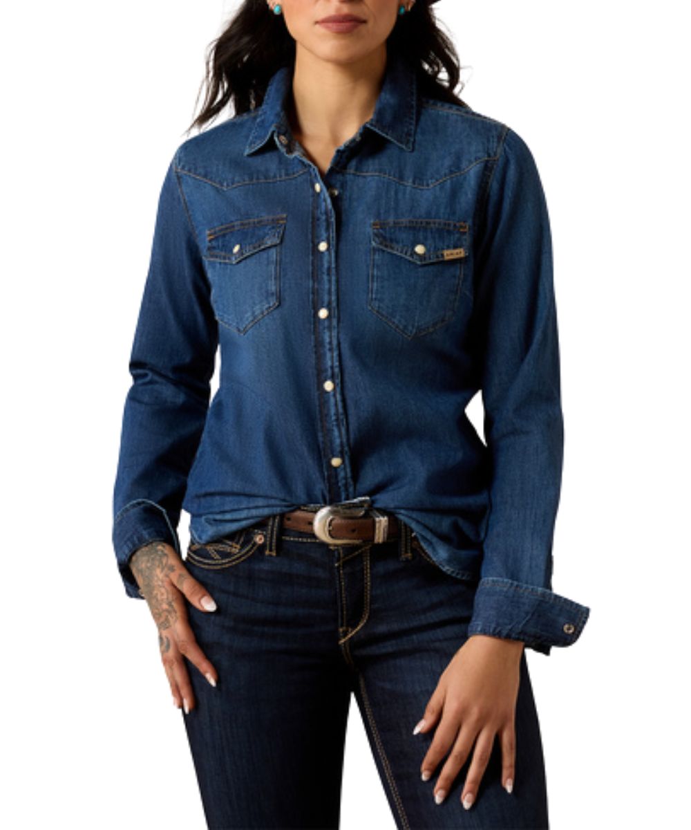 Front view of the women's Ariat Stella Farriday Denim Snap Shirt featuring the chest pockets, pearl snaps, and western yokes