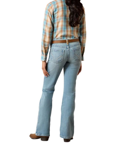 Back view of the girl's slim fit light wash boot cut jean