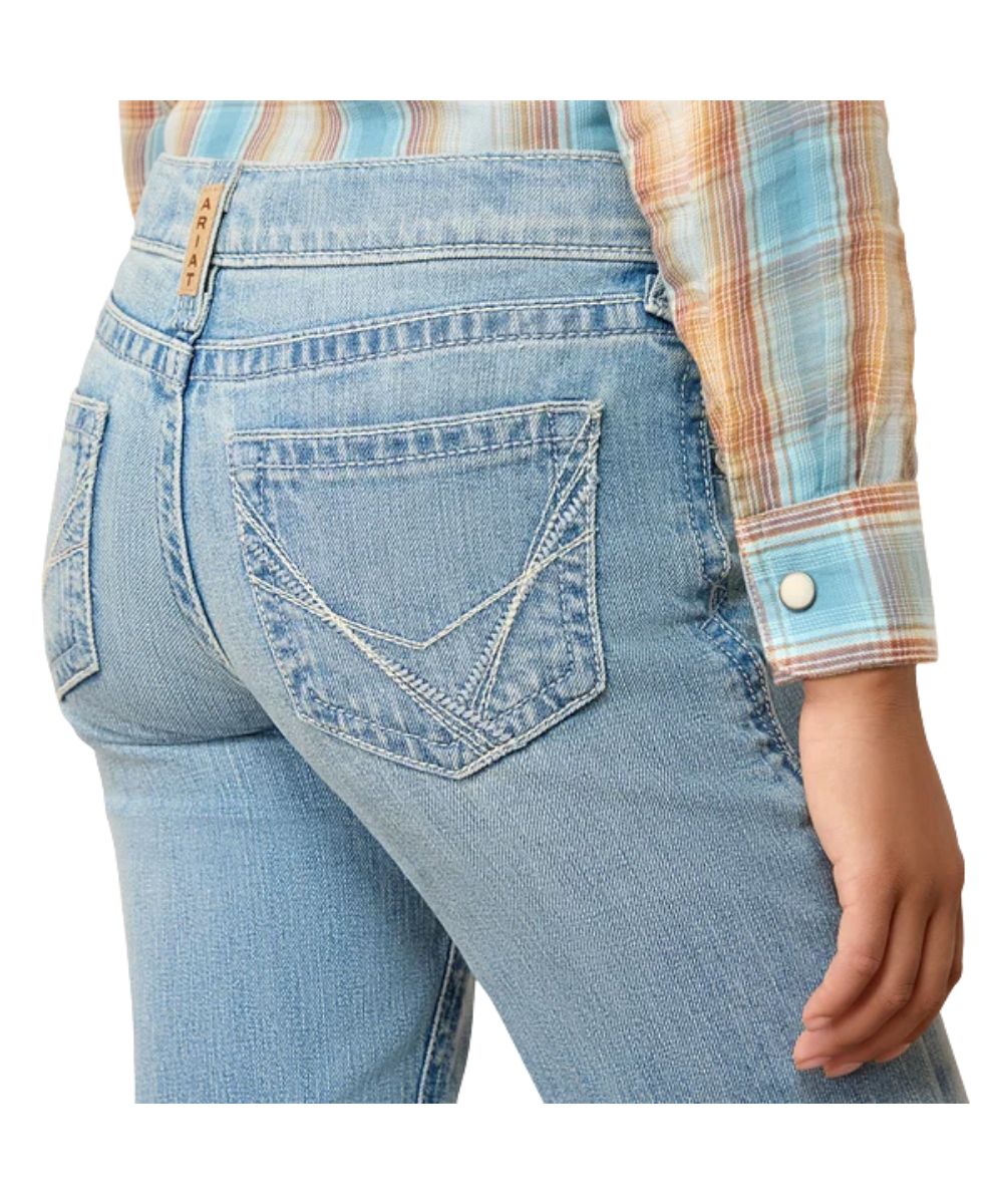 Close-up view of the back pockets featuring the contrast embroidered design