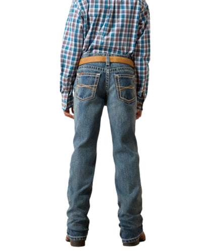 Back view of the boy's medium wash boot cut jean featuring the mid rise