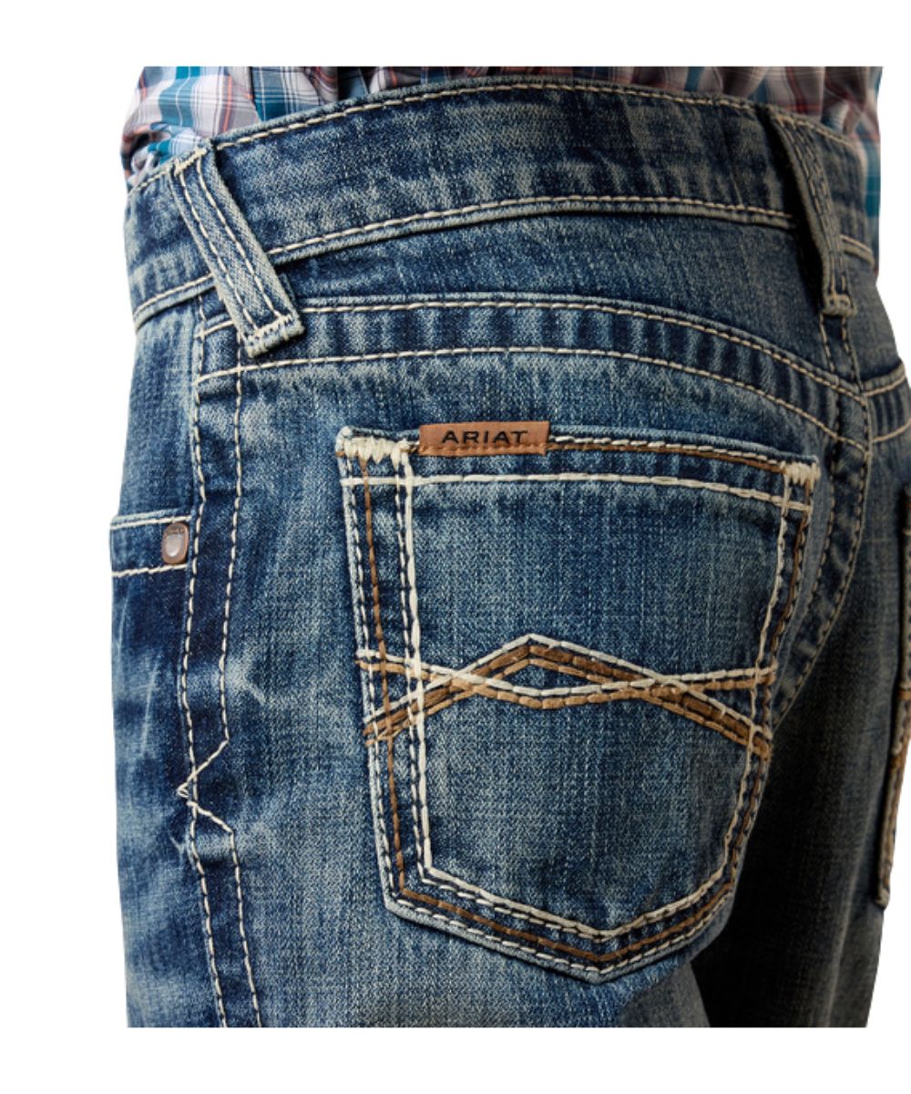 Close-up view of the back pocket featuring the contrast stitching