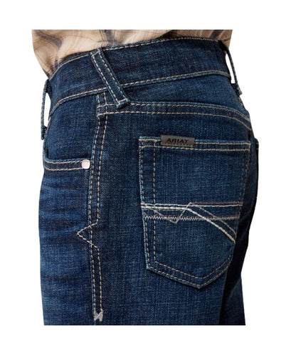 Close-up view of the back pocket featuring the tonal embroidered design