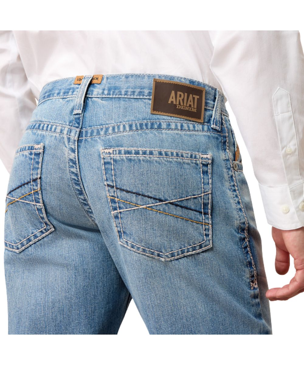 Close-up view of the contrast stitched back pockets and loop lock on the back belt loop for extra durability