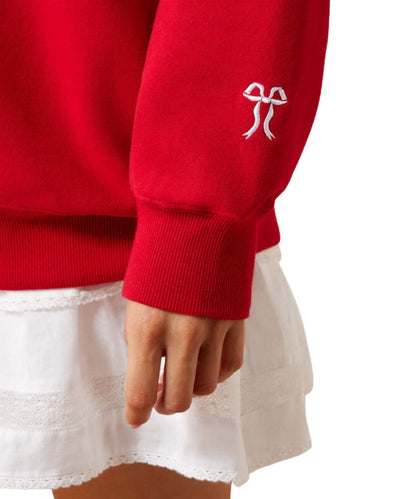 white bow embroidery on crimson sleeve with white background