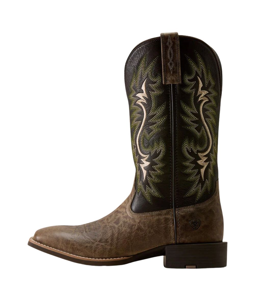 A single western cowboy boot shown in profile against a white background. The boot features a distressed brown leather foot and a dark brown shaft with light tan embroidered floral patterns.