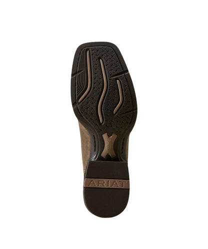The outsole of a brown leather boot, showing the textured tread pattern and the brand name 'ARIAT' embossed on the heel, set against a plain white background.