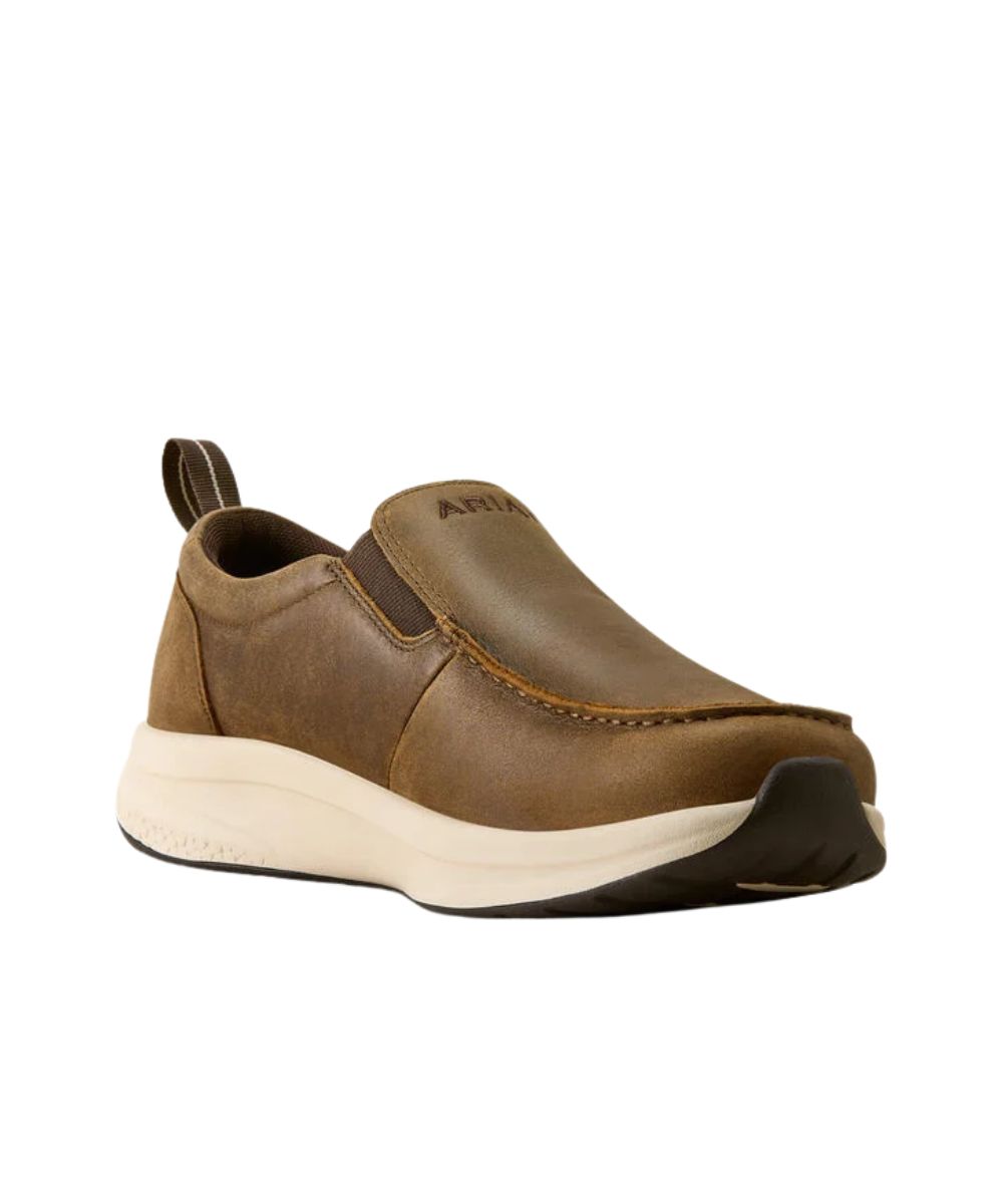 A brown slip-on shoe with a thick cream midsole and a black outsole, shown from a side profile on a white background.