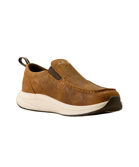 A brown slip-on shoe with embossed floral detailing, a thick cream midsole, and a brown outsole, shown against a plain white background.