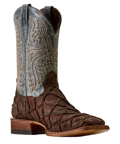A single western cowboy boot with a dark brown crocodile-embossed toe and shaft, featuring a textured blue leather upper shaft with intricate white embroidery, set against a plain white background.